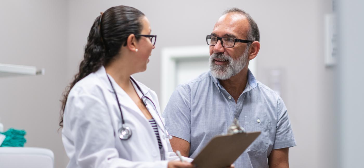 Doctor and man in clinic