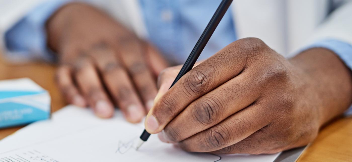 dr writing medical notes