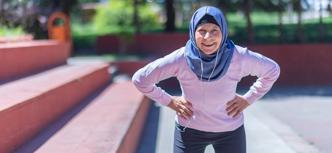 Middle East mature woman exercising