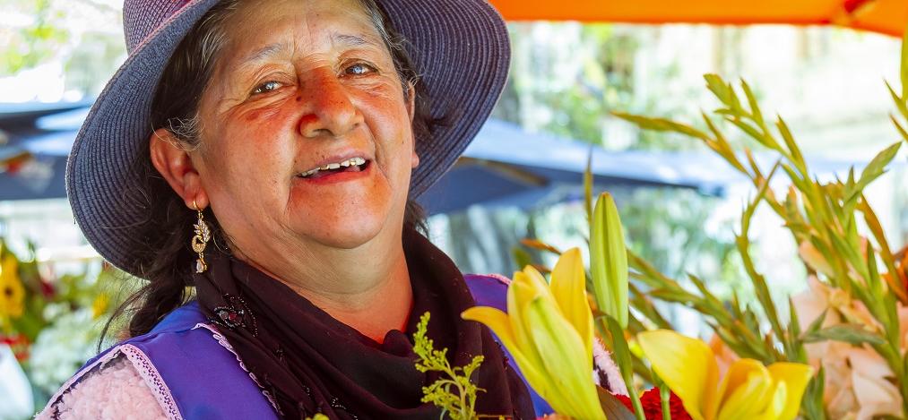 Ecuadorian woman with flowers