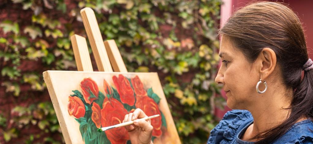 older woman paintings flowers