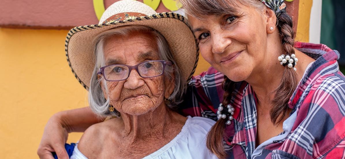 Colombisn older woman and daughter who is smiling