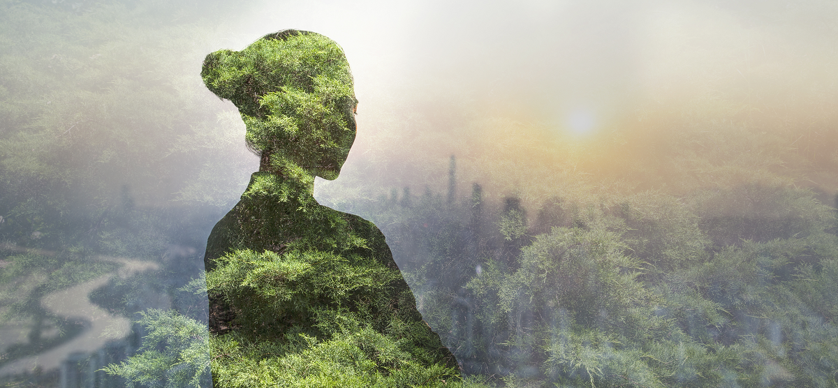 woman and trees and city