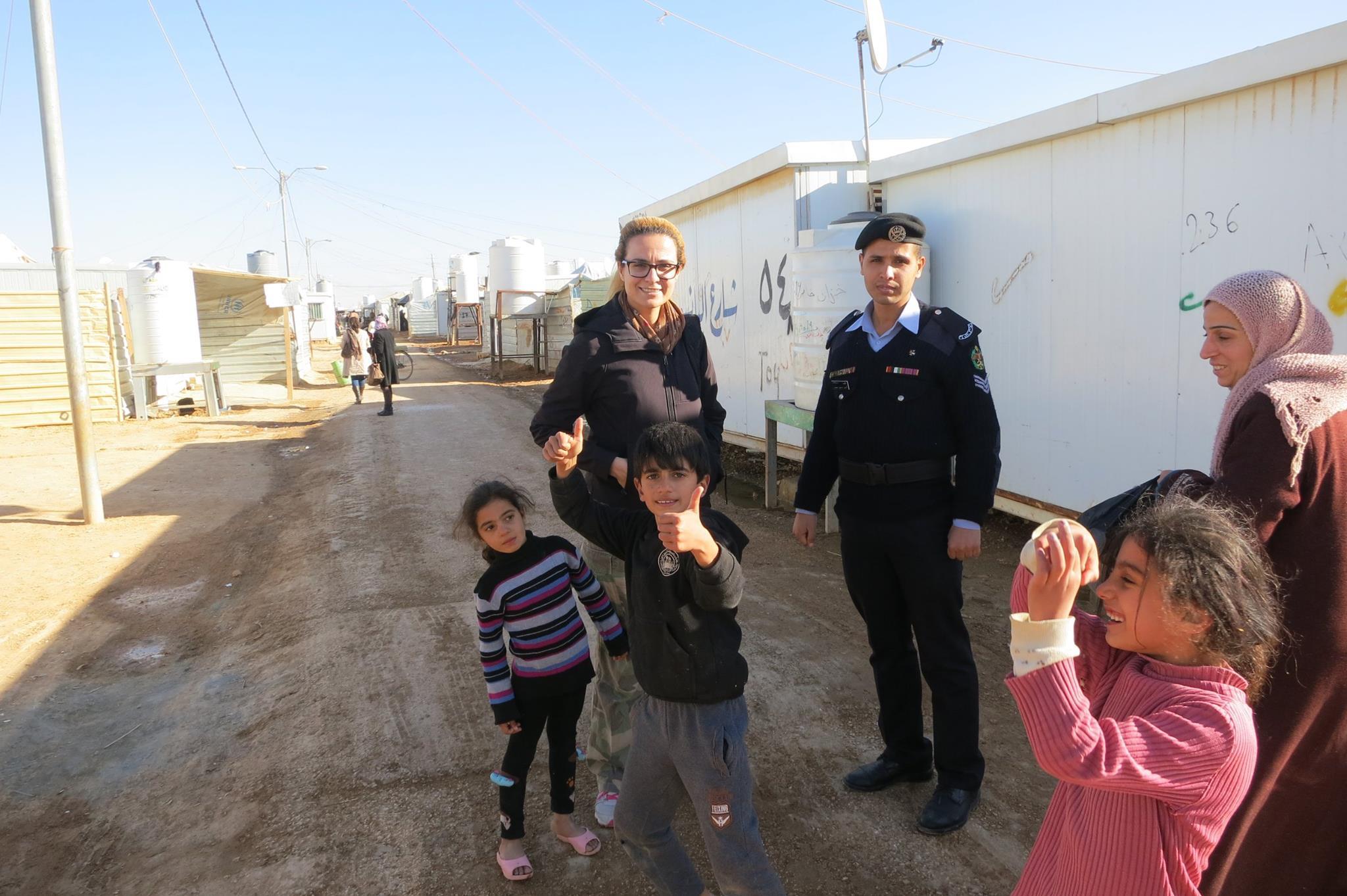 Tala Al-Rousan with refugees, including young children, in Syria