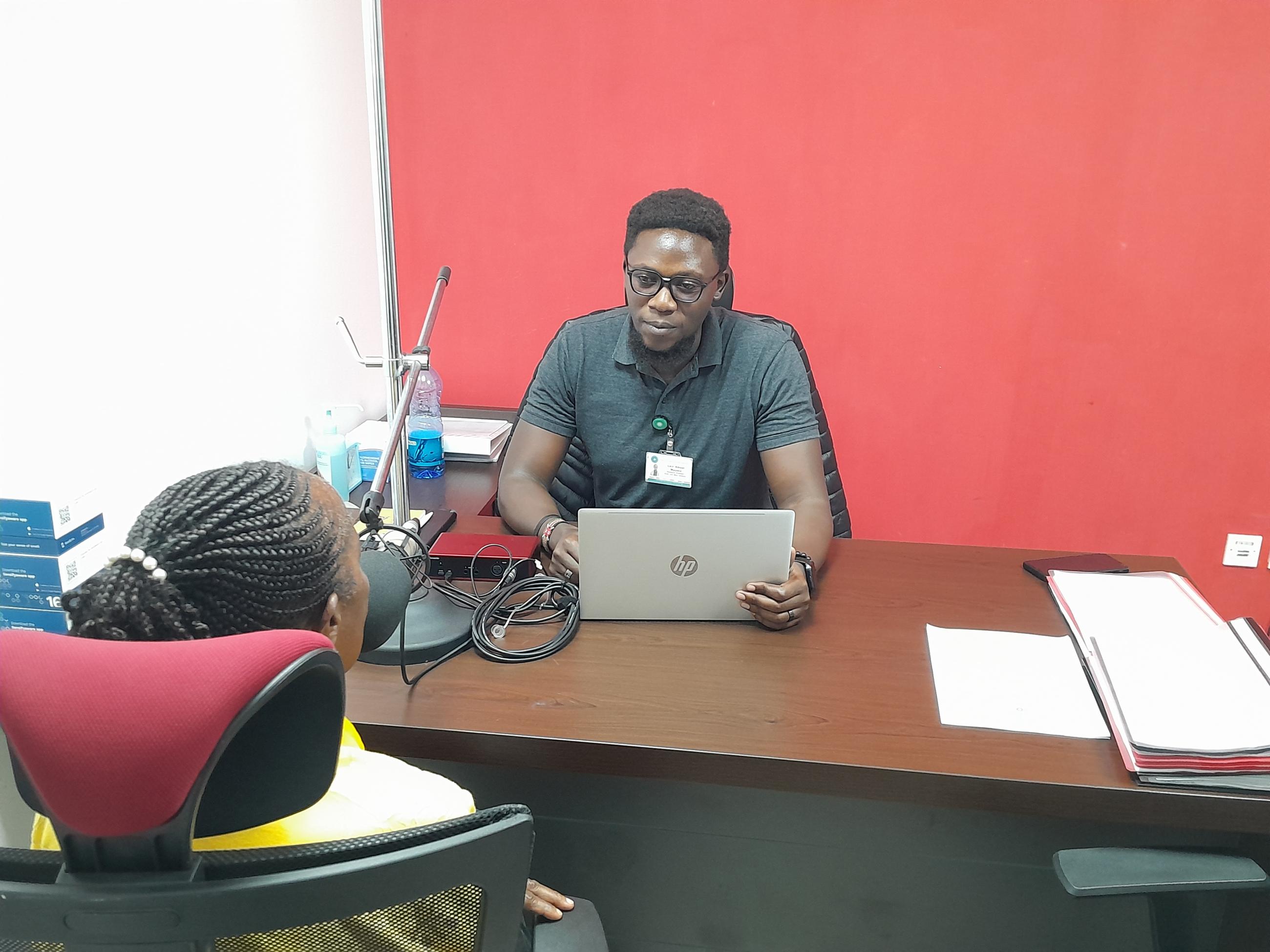 A Kenyan neuropsychologist collects speech samples from a patient using TELL in a memory clinic in Nairobi.