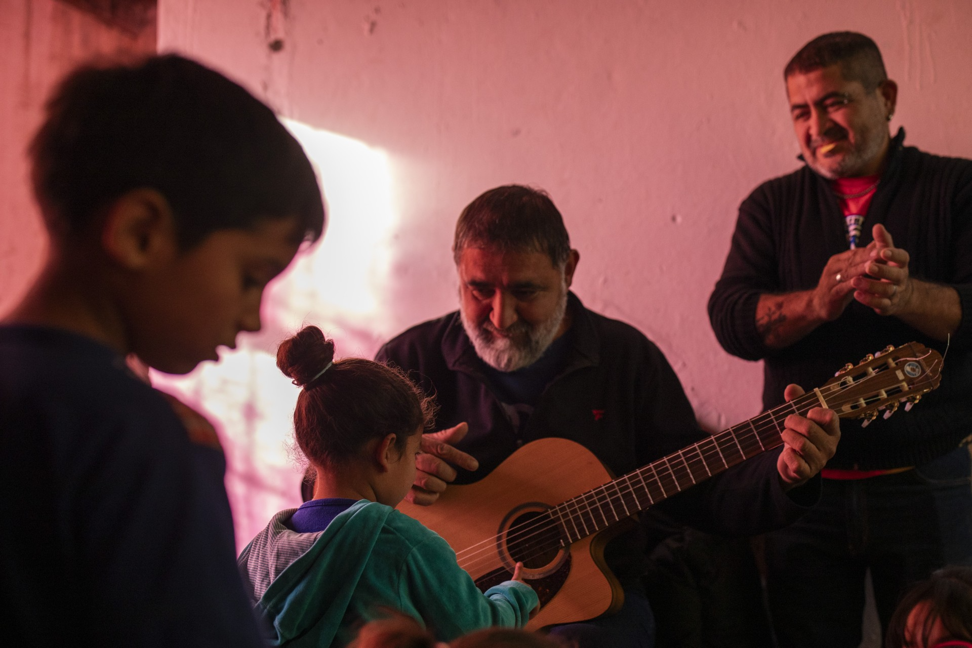 Making A Way out of No Way guitarists and children