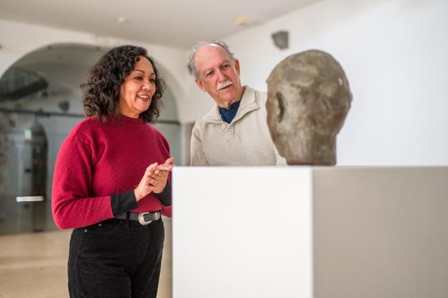 couple with head sculpture