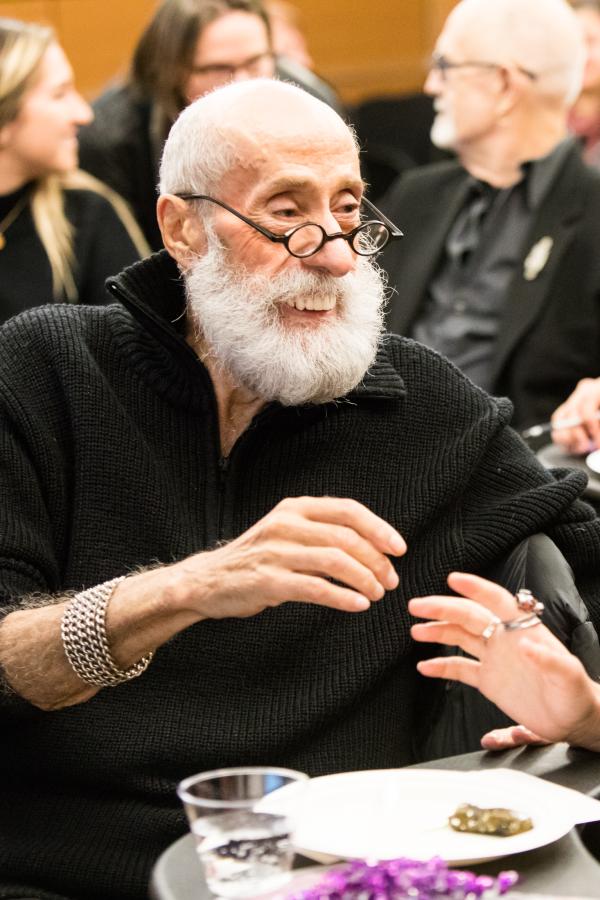 Two participants in the Multi-modal Intergenerational Social Contact Intervention (MISCI) for Creative Engagement showcase share a laugh