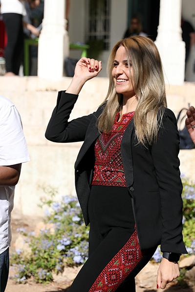 Atlantic Senior Fellow Tala Al-Rousan engages with community members at a refugee meeting in Jordan