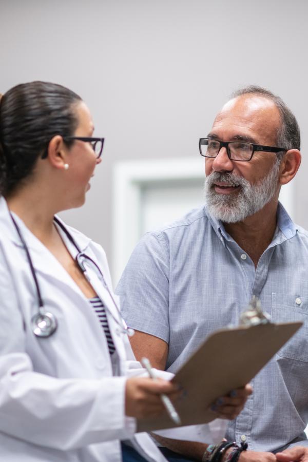 Doctor and man in clinic