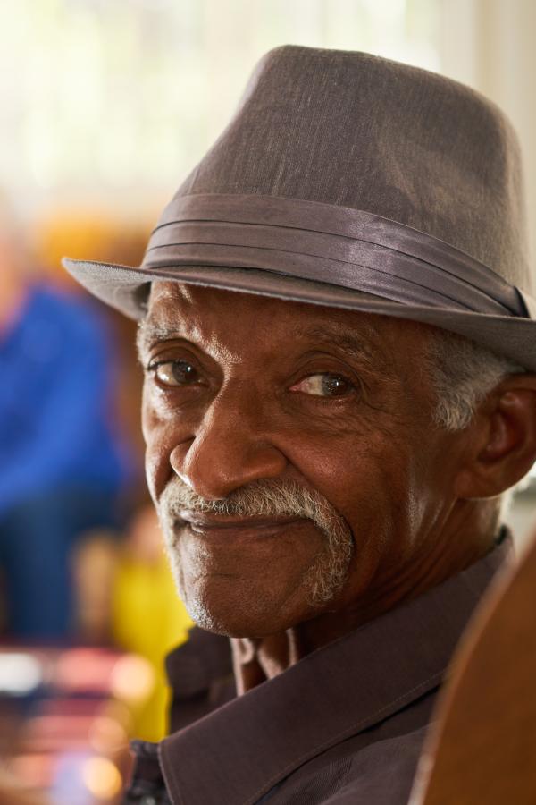 Older Cuban man with fedora