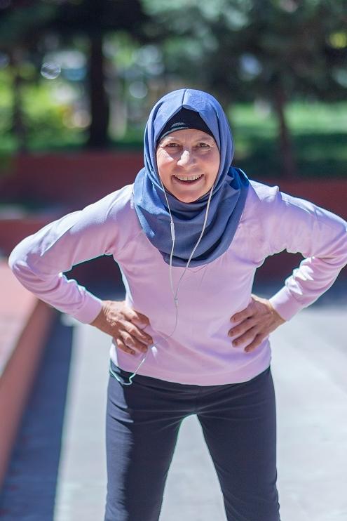 Middle East mature woman exercising