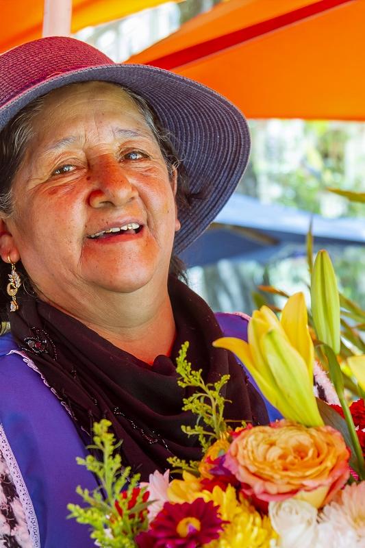 Ecuadorian woman with flowers