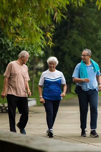 Senior friends walking in the park