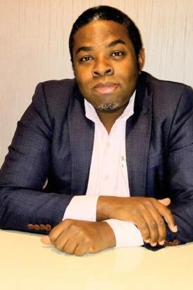 Headshot of Kamada Lwere