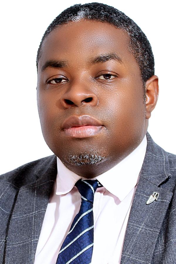headshot of kamada lwere