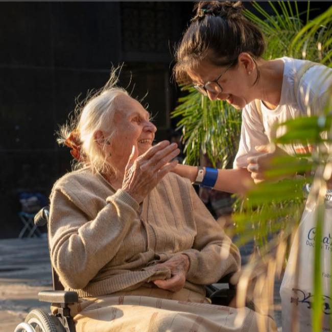 Older woman and younger woman talking