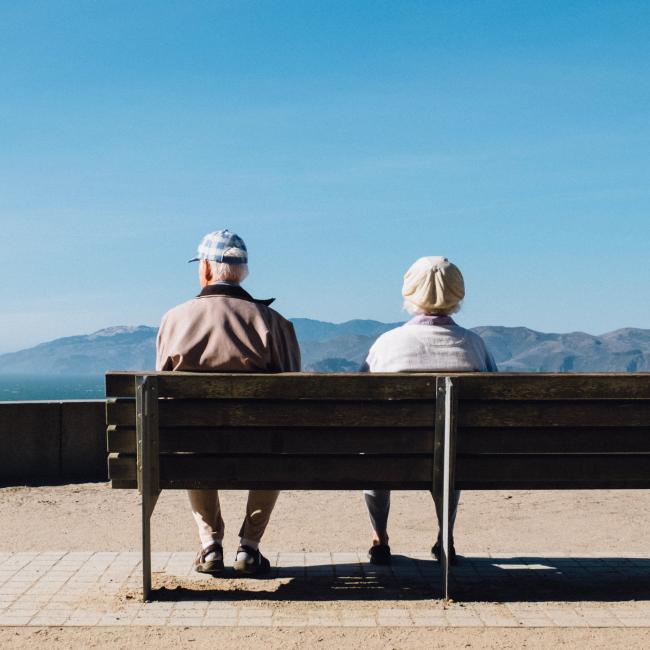 Older couple on bench