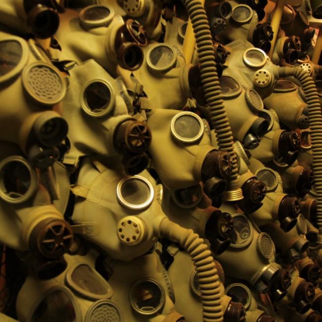 a wall of gas masks