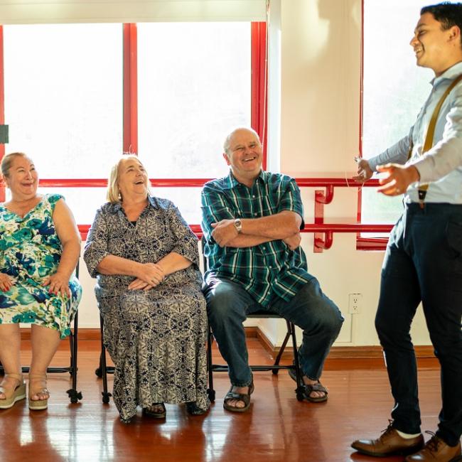 Old people sitting in a studio
