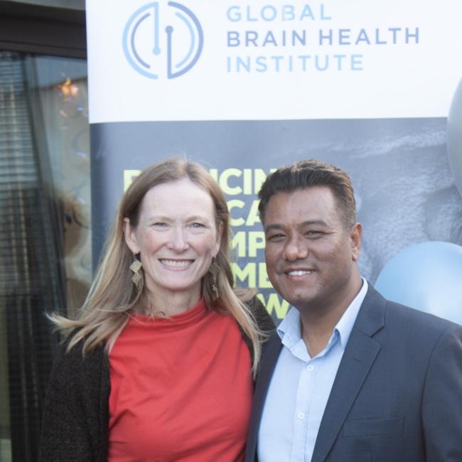 Kate Possin and Umesh Bogati smiling together at the graduation celebration for the 2023 Atlantic Fellows for Equity in Brain Health.