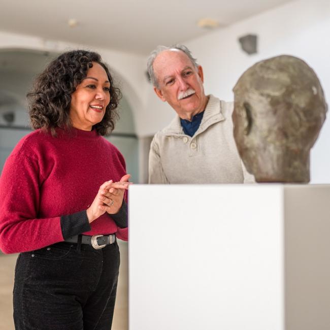 couple with head sculpture