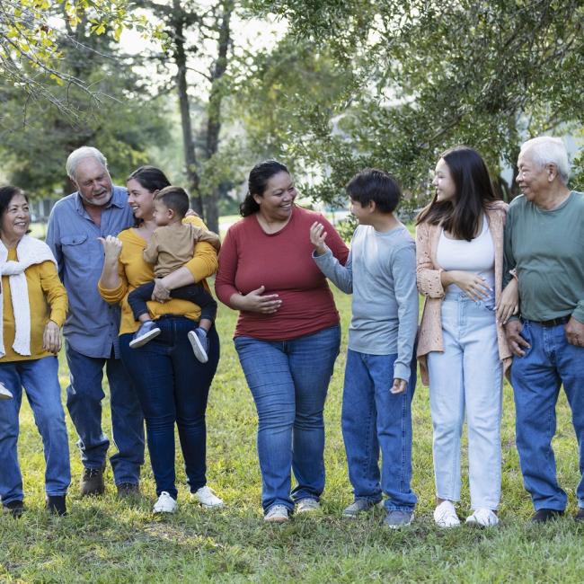 group of people outdoors in conversation