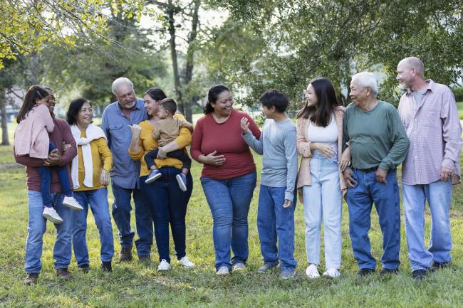 group of people outdoors in conversation