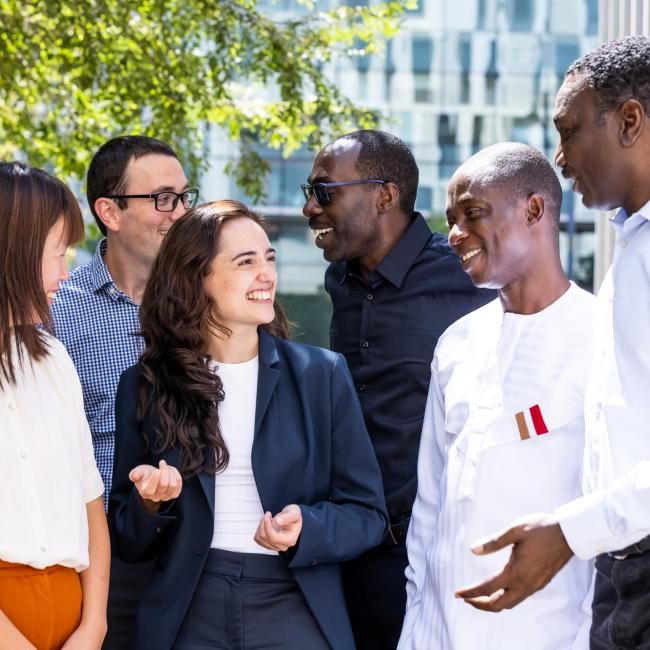 Four Atlantic Fellows for Equity in Brain Health—Nuole Zhu, Agustina Legaz, David Larbi Simpong, and Godwin Ogbole—standing together at UCSF