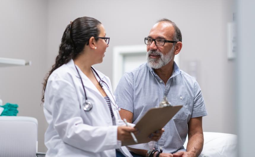 Doctor and man in clinic
