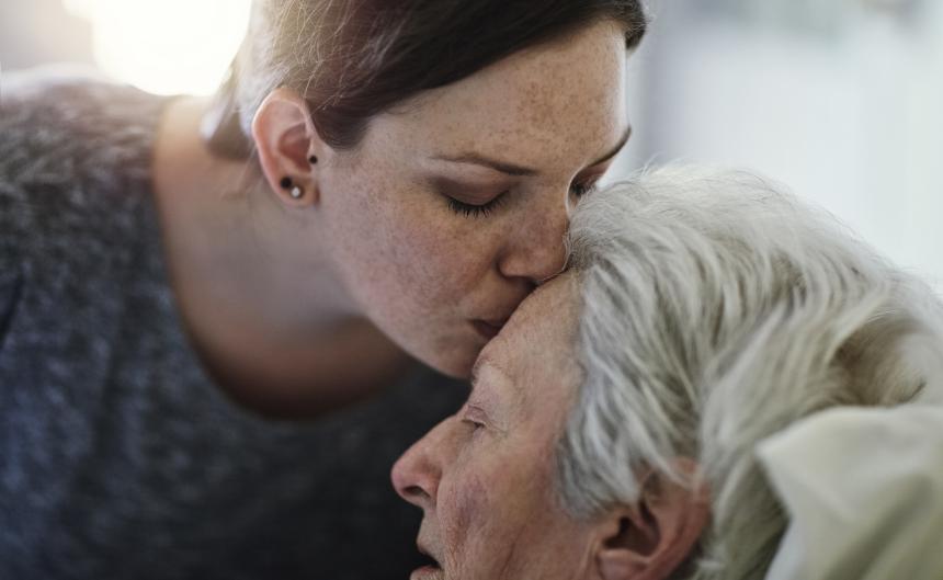 sick older lady with daughter