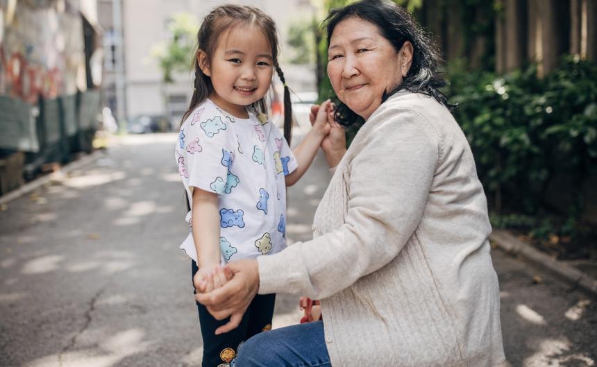 Grandma and her granddaughter on the street