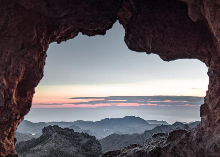 View from inside a cave looking out