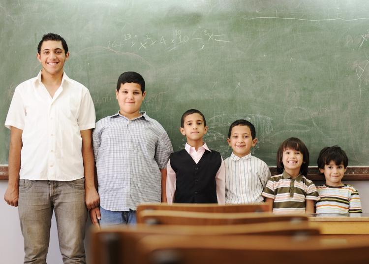 people of different ages in a classroom