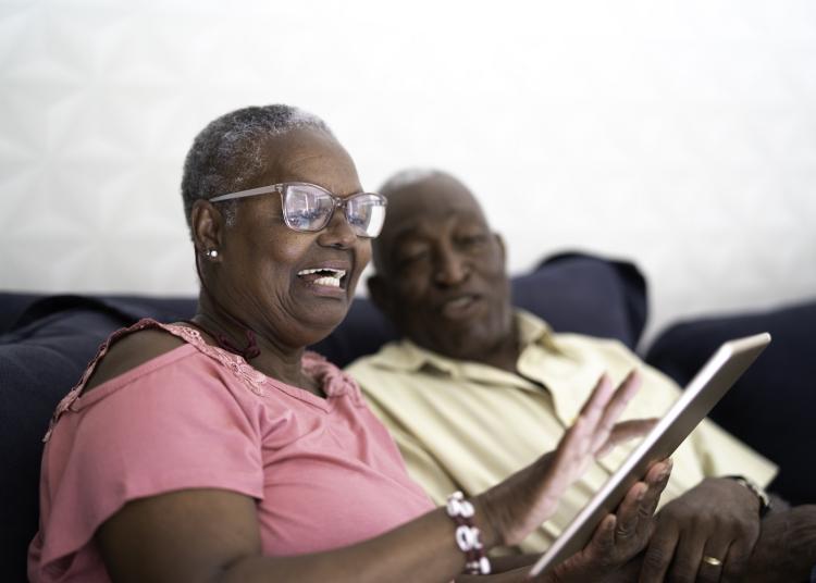 older couple with tablet