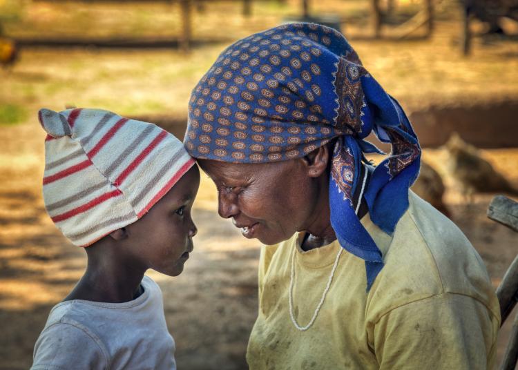 African grandmother together with her granddaughter