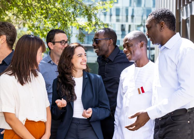 Four Atlantic Fellows for Equity in Brain Health—Nuole Zhu, Agustina Legaz, David Larbi Simpong, and Godwin Ogbole—standing together at UCSF