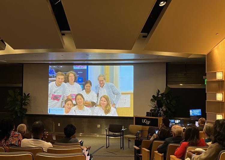 Audience watches a live video connection with Atlantic Fellows participating in the Leadership in Action: Global Brain Health Satellite Sessions.