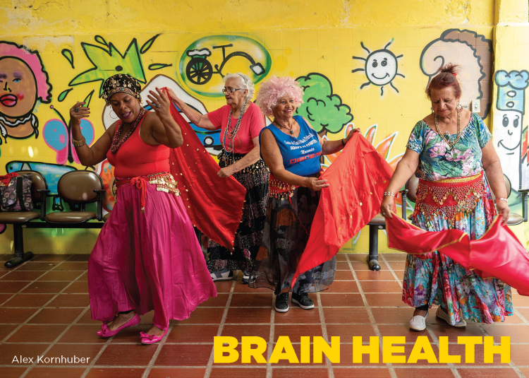 women dancing in colorful outfits